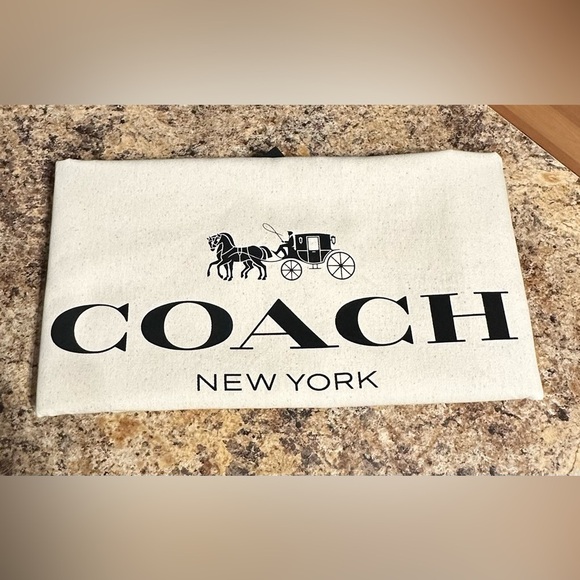 Coach dusty NWOT. Size approximately 24 3/4 x 25 1/2.